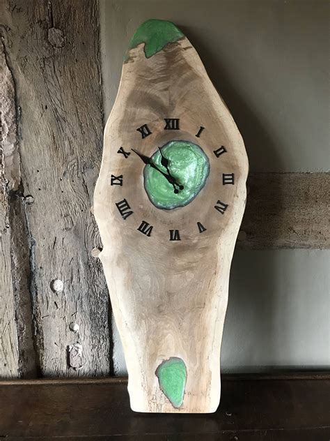 walnut epoxy resin clock sold  manorwood  etsy
