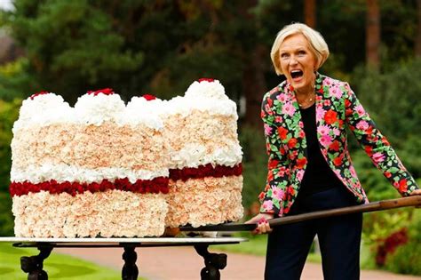 Mary Berry Scoops A Massive Cake Made Of Flowers With A Cheeky Grin On