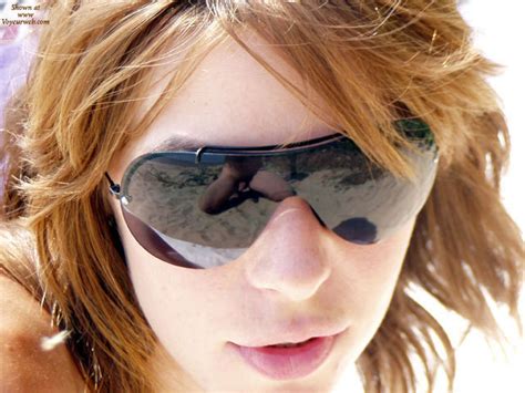 photographer reflection in sunglasses january 2007 voyeur web hall of fame