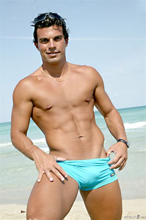 Hunk On The Beach In A Sexy Swimsuit Has A World Class