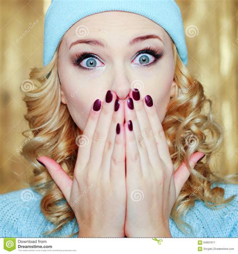 surprised or shocked woman with blue eyes stock image