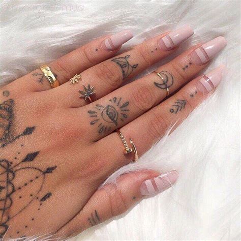 tan nails w design tattoos finger tattoos hand tattoos