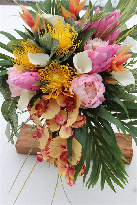 tropical bridal bouquet  matching silk flower arrangements silk