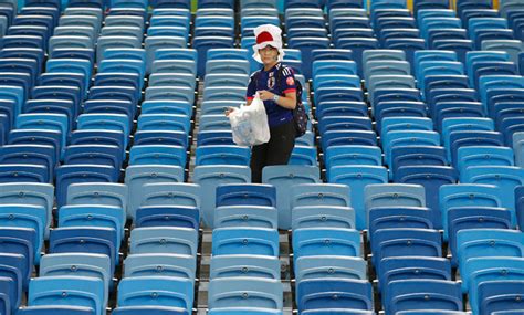 best fans at world cup japanese clean up stadium after team s matches photos — rt world news