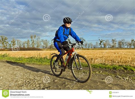 woman riding bicycle stock image image 21012671