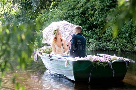 romantic love story in boat woman with wreath and white dress