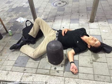 drunk japanese businessmen caught legless on metro daily mail online