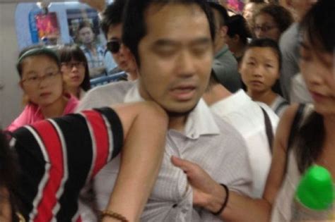 japanese man caught taking upskirt photos on shanghai metro chinasmack