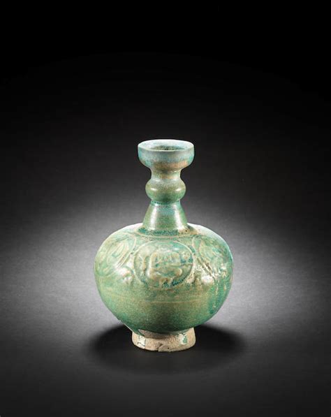 bonhams a seljuk monochrome moulded figural pottery vase persia 12th