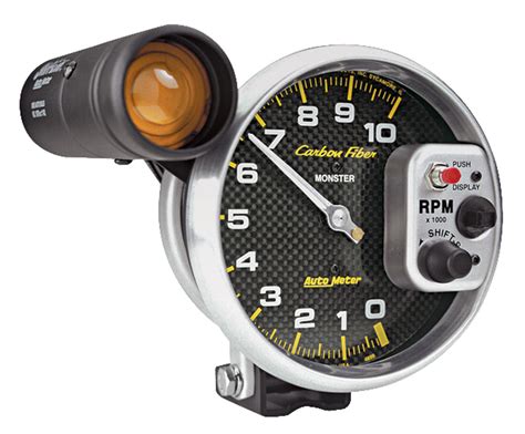 autometer   cutlass gauges carbon fiber series  tach wshift light  rpm