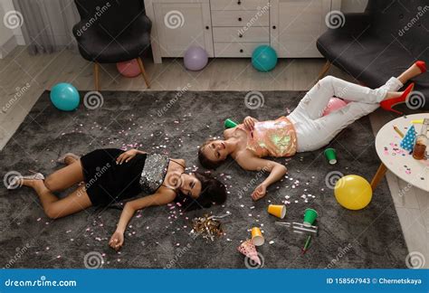 Drunk Friends Sleeping On Floor In Messy Room Stock Image Image Of