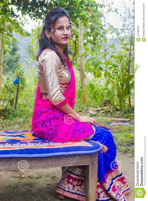 Beautiful Nepali Girl In Lehenga Dress Posing For Photograph Editorial