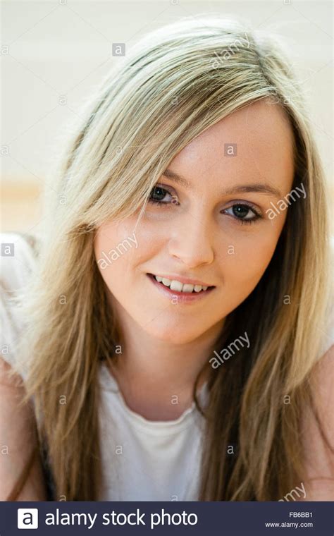 caucasian teenage girl face smiling looking at viewer