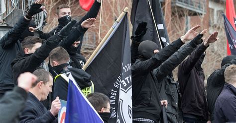 uk national socialists hold hands in court after being charged with membership of banned terror