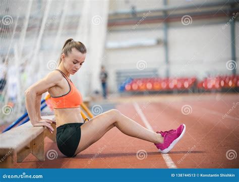 Young Athletic Woman Exercising Using A Bench Stock Image Image Of