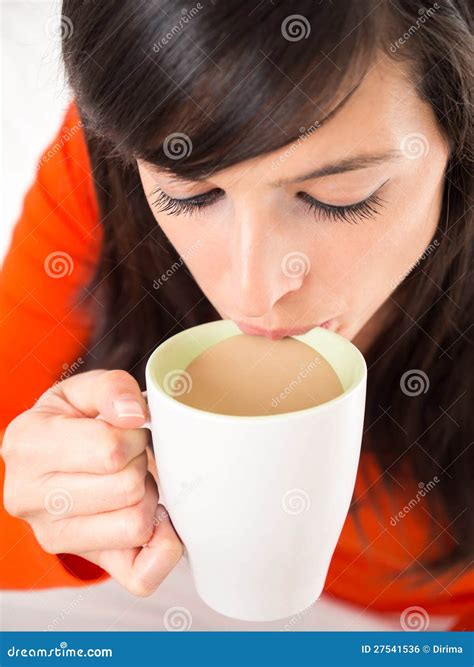 sipping hot coffee stock photo image  person sipping