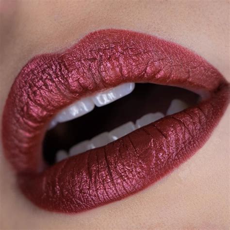 red metallic lipstick focus beauty style