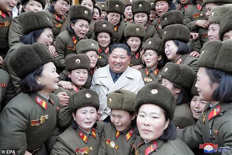 north korean leader kim jong   surrounded  identikit army girls