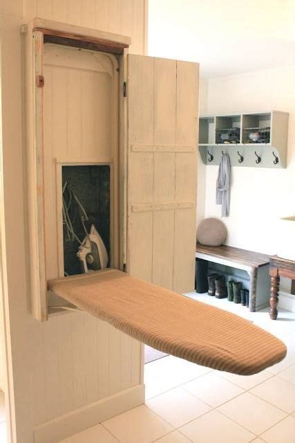 save space by building an ironing board cupboard right