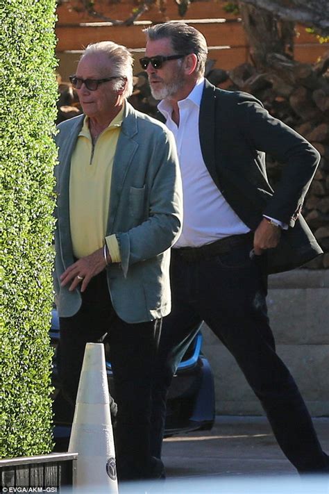 pierce brosnan looks dashing in casual suit and shades as he s joined by son dylan daily mail