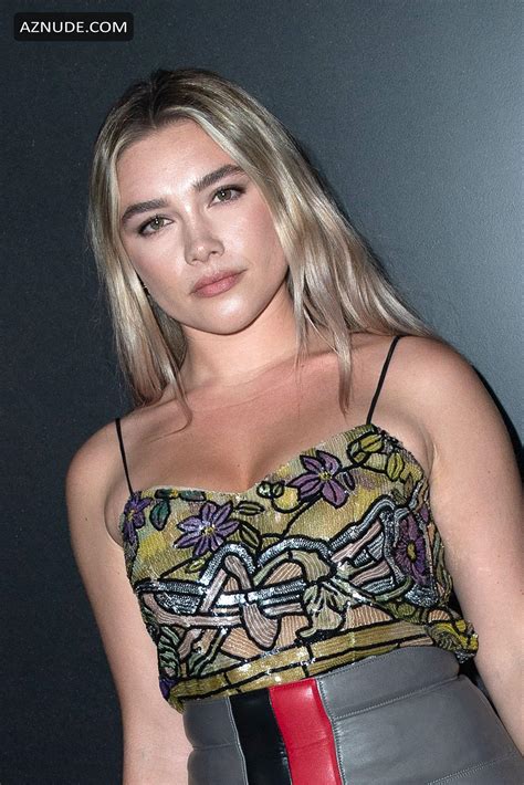 florence pugh was photographed at the louis vuitton front row
