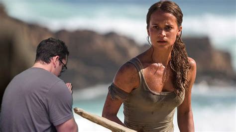 first official tomb raider reboot images shows lara croft in action