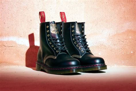 dr martens womens  yotd limited edition year   dog martens boots uk