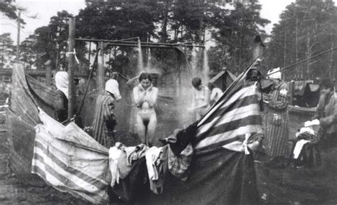 bergen belsen germany released women prisoners taking a shower in the camp after the
