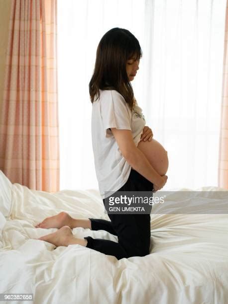 world s best asian women giving birth stock pictures photos and