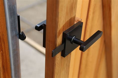 wooden doors  metal handles   side     black