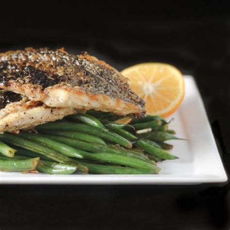 Black Sea Bass Fillets Are Cooked Skin Down At A High