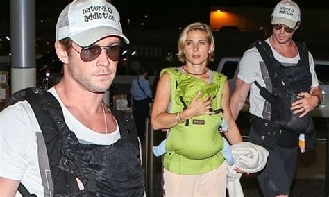 chris hemsworth and wife elsa pataky hold their twins as they jet out of lax daily mail online