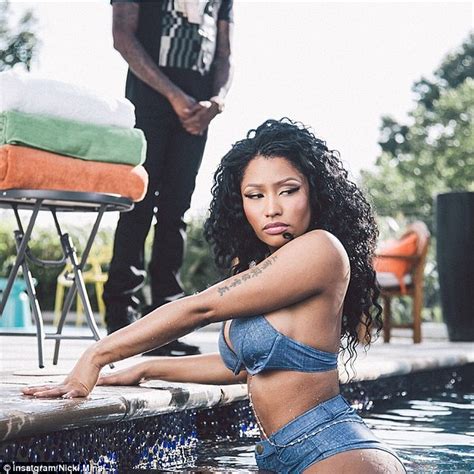 nicki minaj oozes sex appeal in denim bra and high rise shorts from the pool for racy photo