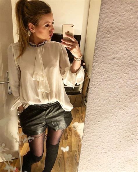 Mirror Selfie Of Black Thigh High Boots On Black Pantyhose With Shorts