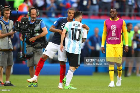 Kylian Mbappe Of France Embraces Lionel Messi Of Argentina At The End