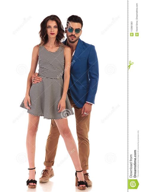 Attractive Couple Posing Together With Man Holding Woman`s