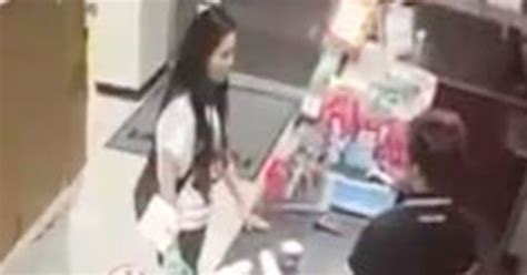 woman urinates in cup on shop counter then drinks it as a protest about