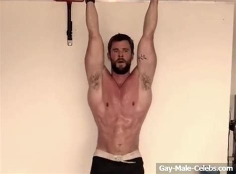 chris hemsworth shirtless and showing his strong abs gay male