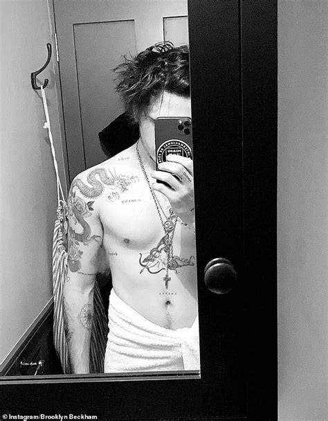 romeo beckham debuts new arm cherub tattoo in shirtless snap with