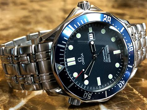 omega seamaster  professional diver quartz mm blue wave  model  sansom watches