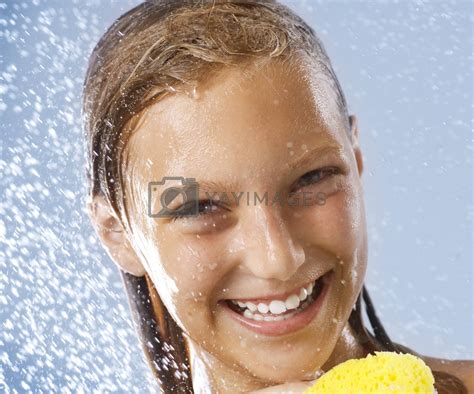 happy teen girl taking shower bath healthy skin washing by subbotinaa