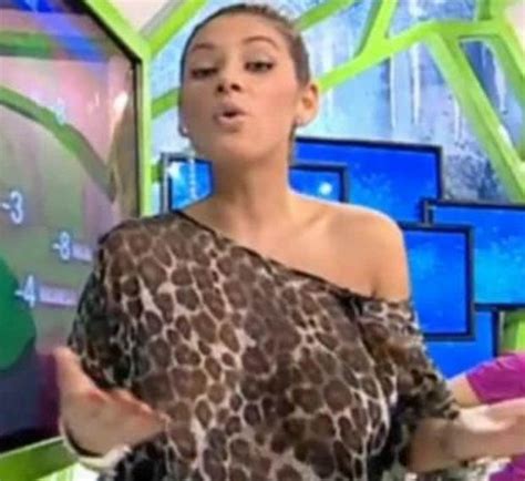 weather girl exposes boobs in totally see through top on