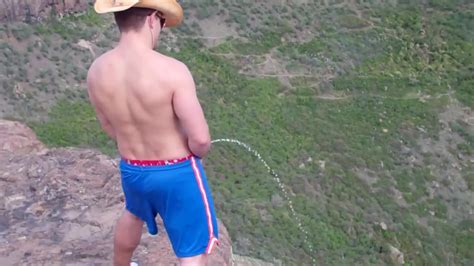 str8 hot guy pissing into the wind gay pissing porn at