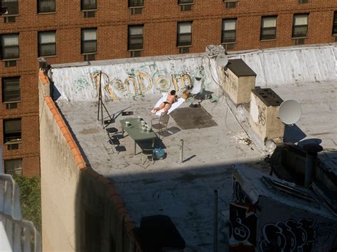 Woman Sunbathing On New York City Roof Top Flickr
