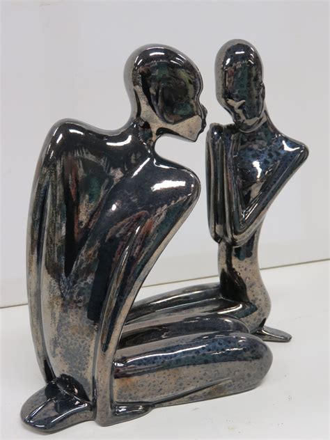 keramiek voorbeeld twee beelden man en vrouw deze een kleur gegeven met een glazuur techniek