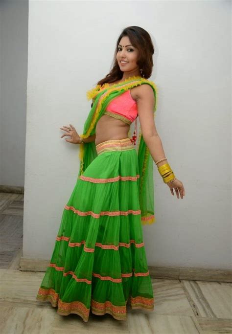 Actress Komal Jha Hot Sexy Pics In Green Dress Cap