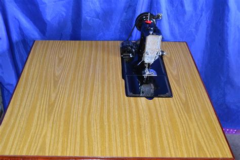 singer  featherweight sewing machine  table