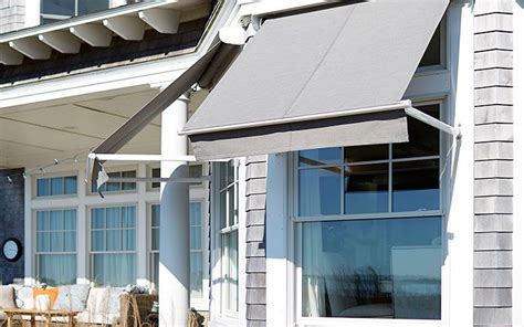 sunbrella seamless shades  grey house awnings architecture window awnings