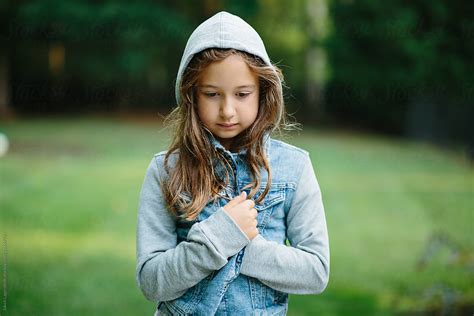 «portrait Of A Cute Young Girl In A Hooded Denim Jacket Del