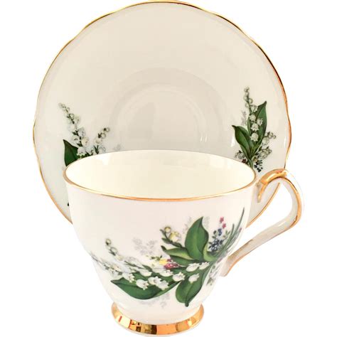 ready   month      pretty bone china lily   valley teacup  saucer